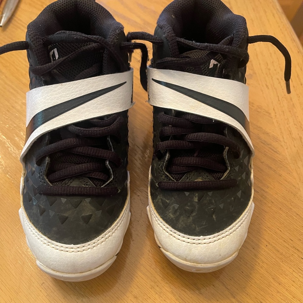 Size 12c , used one season for tball.